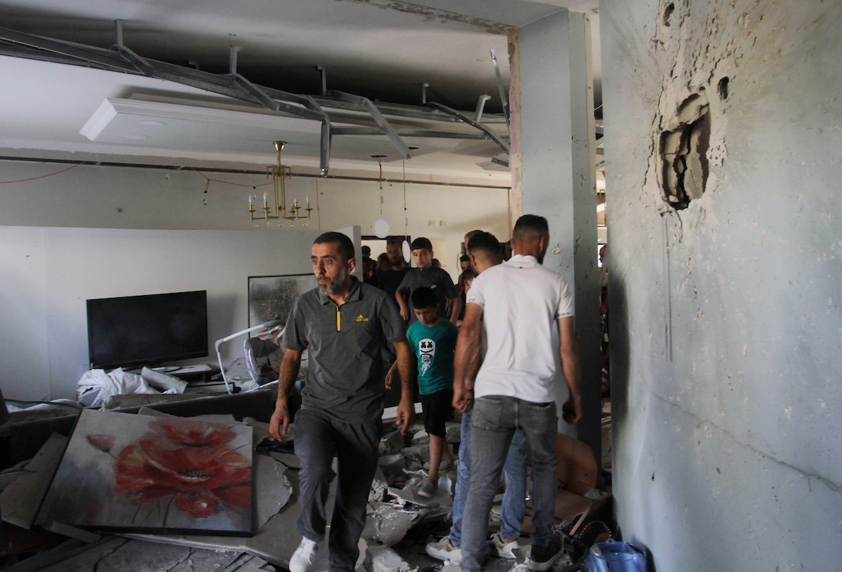 Palestinians on September 01 2023 inspect the damage inside a building destroyed during an Israeli forces’ raid on the village of Aqaba near the city of Tubas in the northeastern West Bank. Semi-daily raids in the West Bank by Israeli troops terrorize Palestinian families wreak havoc on homes and cause casualties.