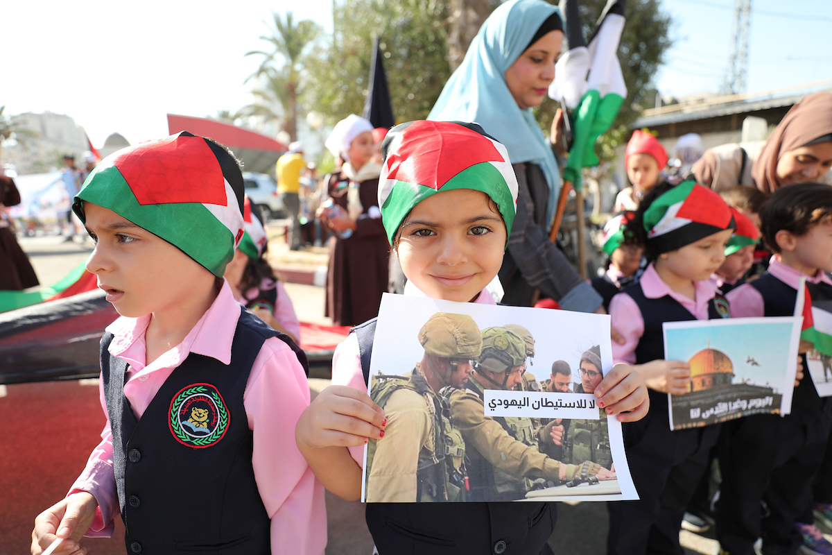 Palestinian children on September 11 2023 participate in a scouting march marking the anniversary of Israeli disengagement from Gaza in Gaza City. The Israeli disengagement from Gaza was the unilateral dismantling in 2005 of the 21 Israeli settlements in the Gaza Strip and the evacuation of Israeli settlers and army from inside the Gaza Strip.